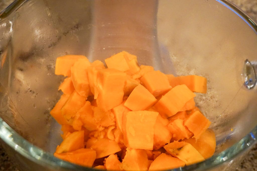 in the process of chopping the sweet potatoes 