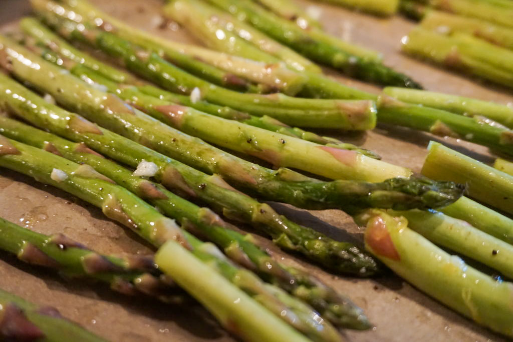 seasoned asparagus before roasting 