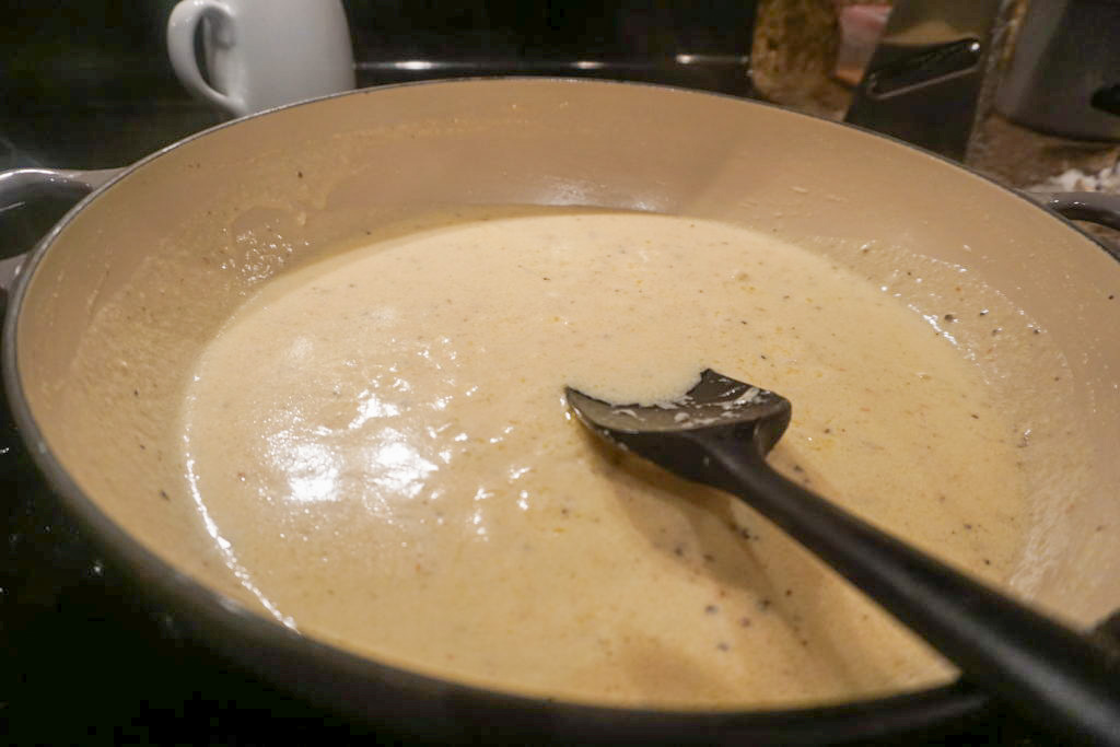 Creamy Alfredo sauce close-up