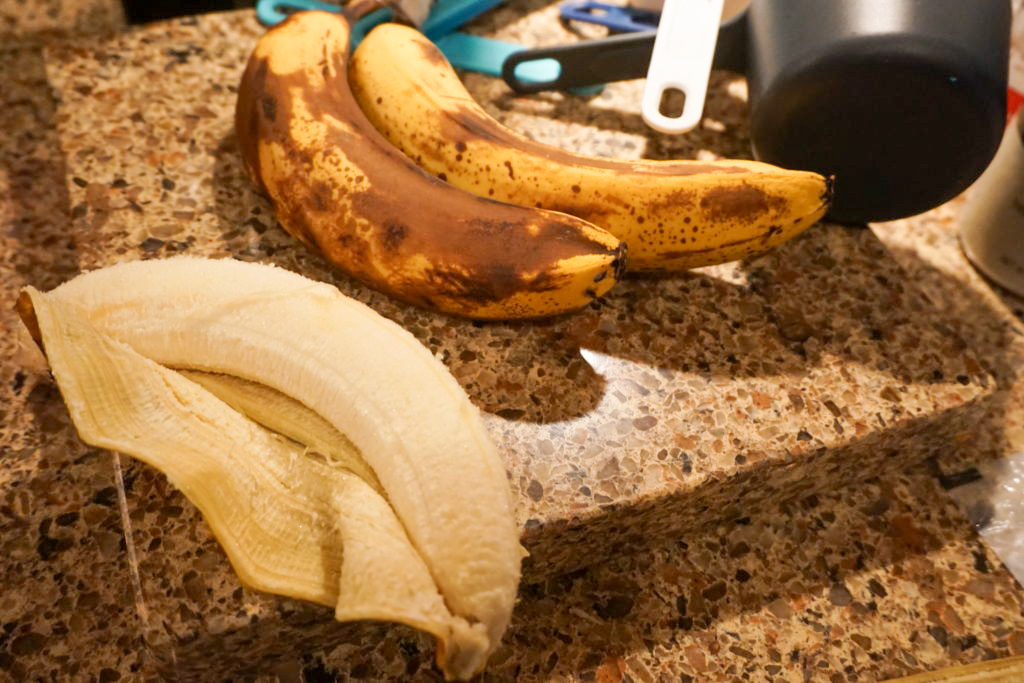 Peeling the ripe bananas