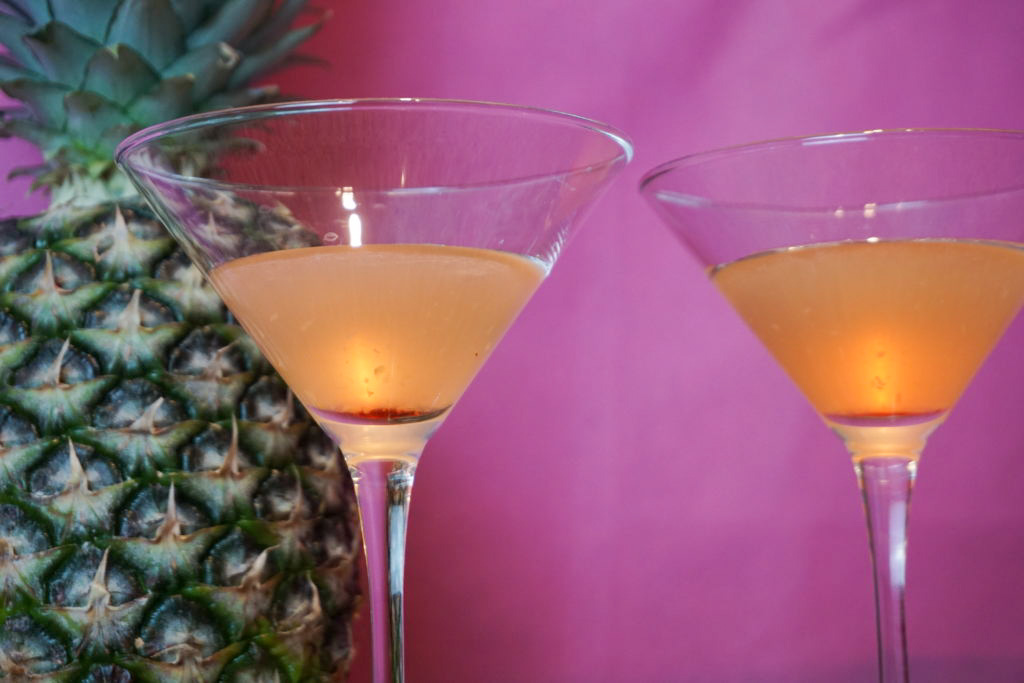 A mixture of the fresh pineapple juice, vodka, and grand marnier