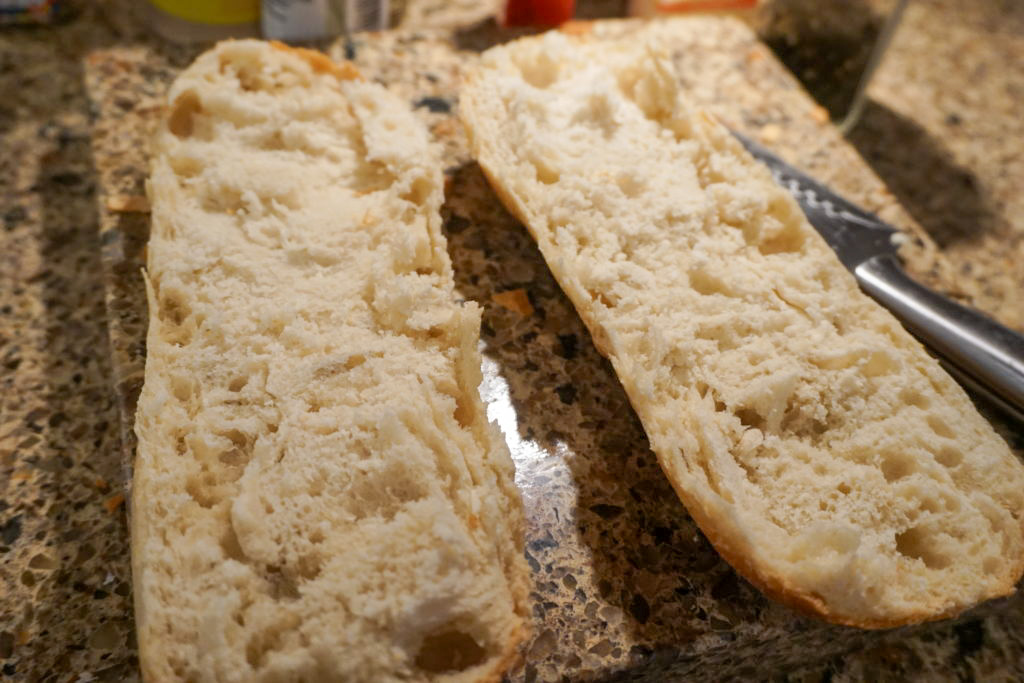 cutting a baguette in half