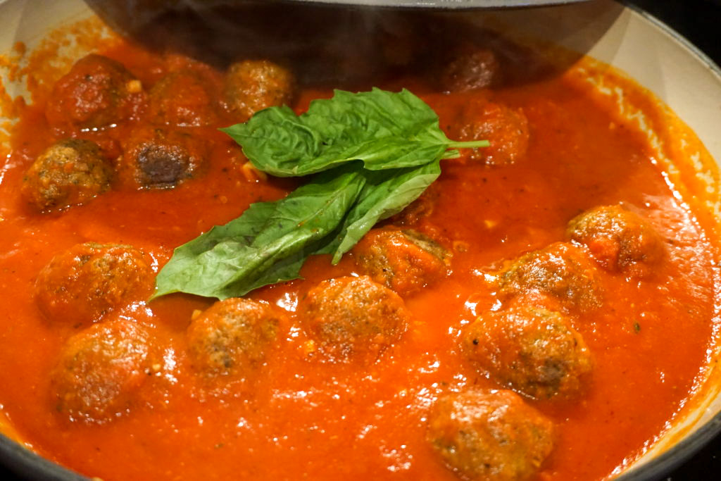 the tomato sauce and the meatballs 