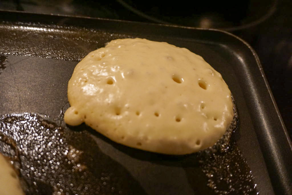 flipping the buttermilk pancakes 