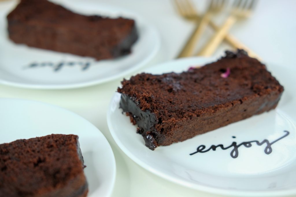 close up of sliced chocolate cake 